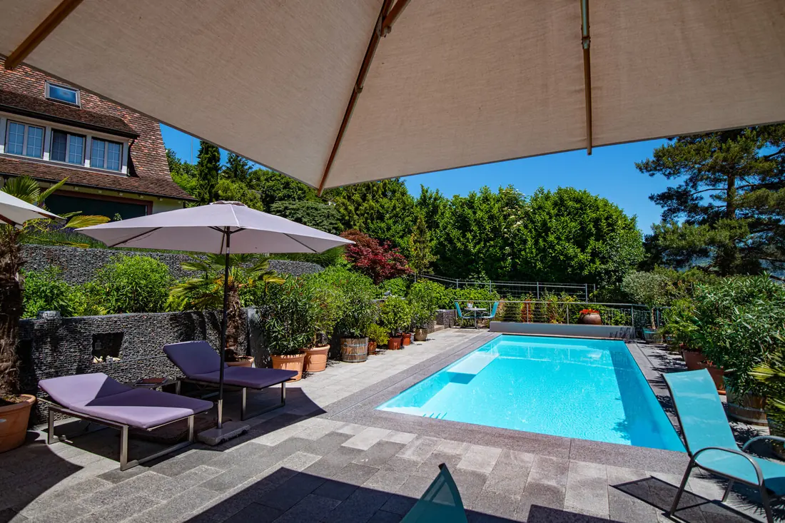 Terrace built over a sliding deck pool cover